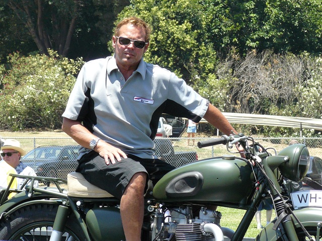 Chad McQueen on a Triumph 'Great Escape' replica