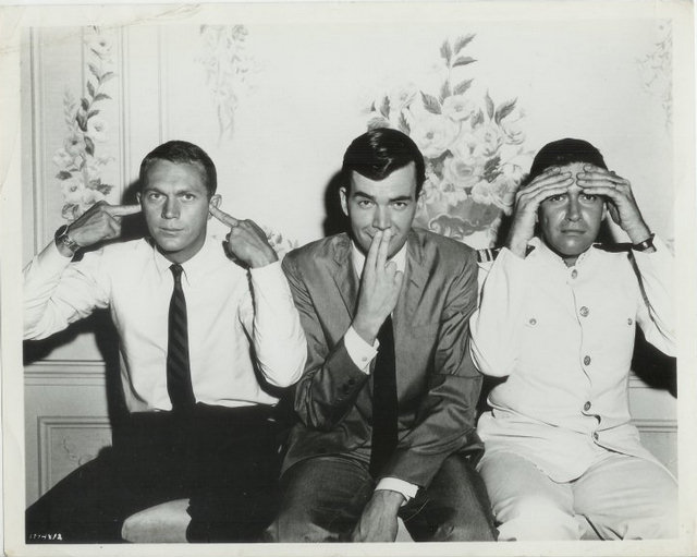 Steve McQueen, Jim Hutton and unknown actor.