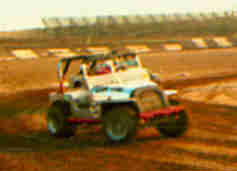 McQueen racing in an off-road buggy at Ascot