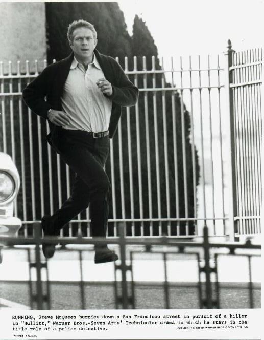 Steve as Frank Bullitt, chasing the assassin down a street.