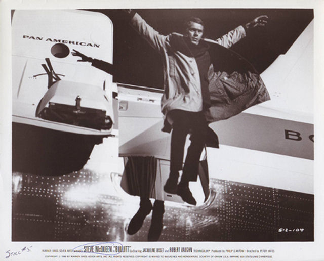 Steve McQueen (as Frank Bullitt) jumps from a plane while pursuing his adversary at the airport.