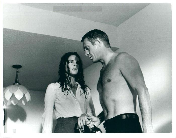 Steve McQueen (as Doc McCoy) 
and Ali MacGraw (as Carol McCoy).