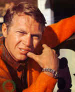 Steve in an orange sweater