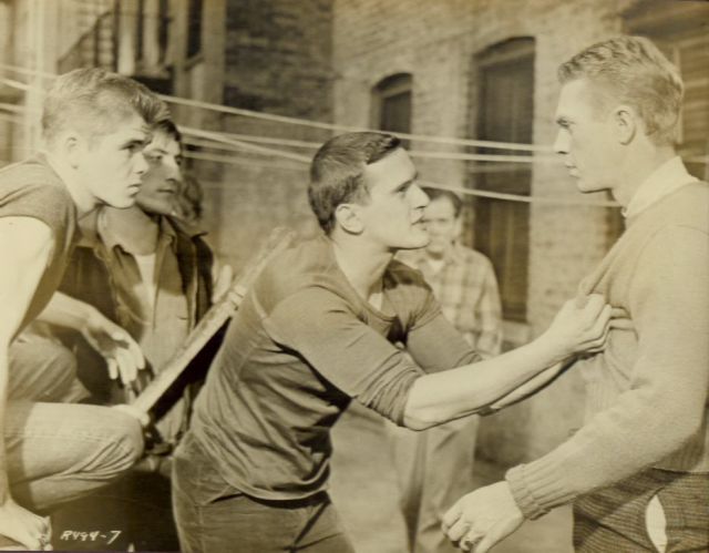 Steve McQueen as 'Martin' is harrased by the local gang.