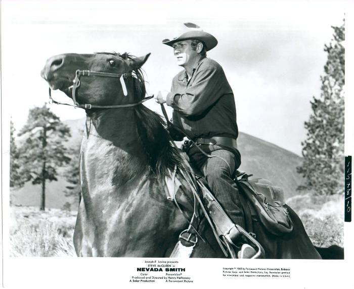 Max (McQueen) on horseback.