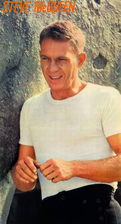 Steve McQueen leaning against an Elephant