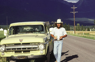 Steve beside Pickup Truck