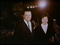 Ernerst Borgnine and Partner arriving at the party