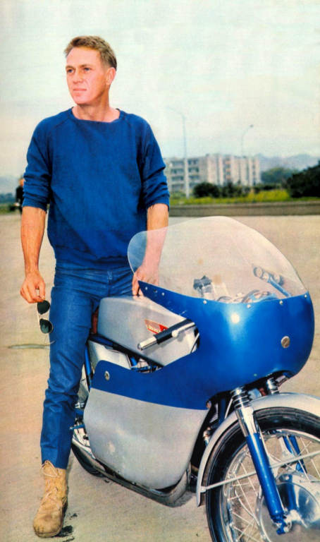 Steve McQueen on a Suzuki motorbike