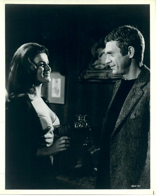 Melba (played by Ann-Margret) flirts with Eric (McQueen).